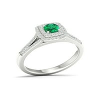 Ženski zaručnički prsten s dvostrukim oreolom od srebra okruglog kroja sa smaragdom i bijelim safirom